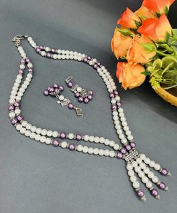 Elegant White Pearl Necklace with Purple Accent